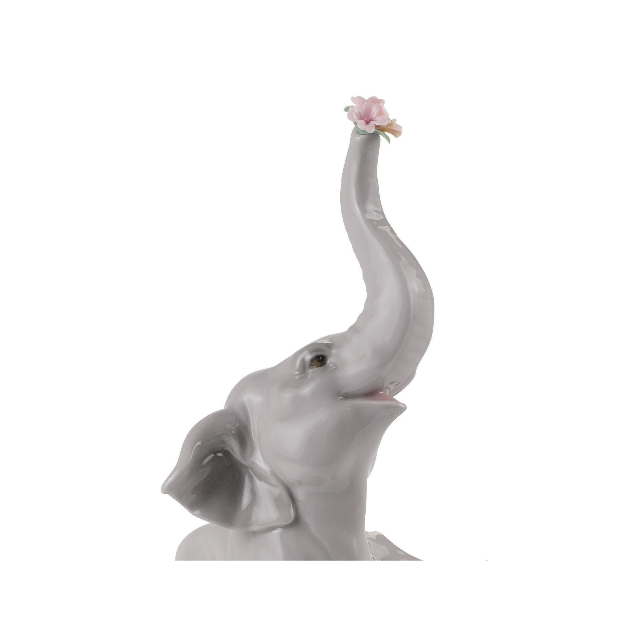 Słoniątko z figurką różowego kwiatu Słoniątko z figurką różowego kwiatu
