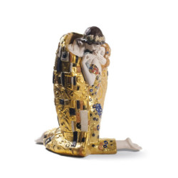 Rzeźba pocałunku pary. Złoty połysk Rzeźba pocałunku pary. Złoty połysk