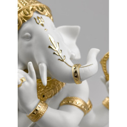 Figurka Bansuri Ganesha . Złoty połysk Figurka Bansuri Ganesha . Złoty połysk