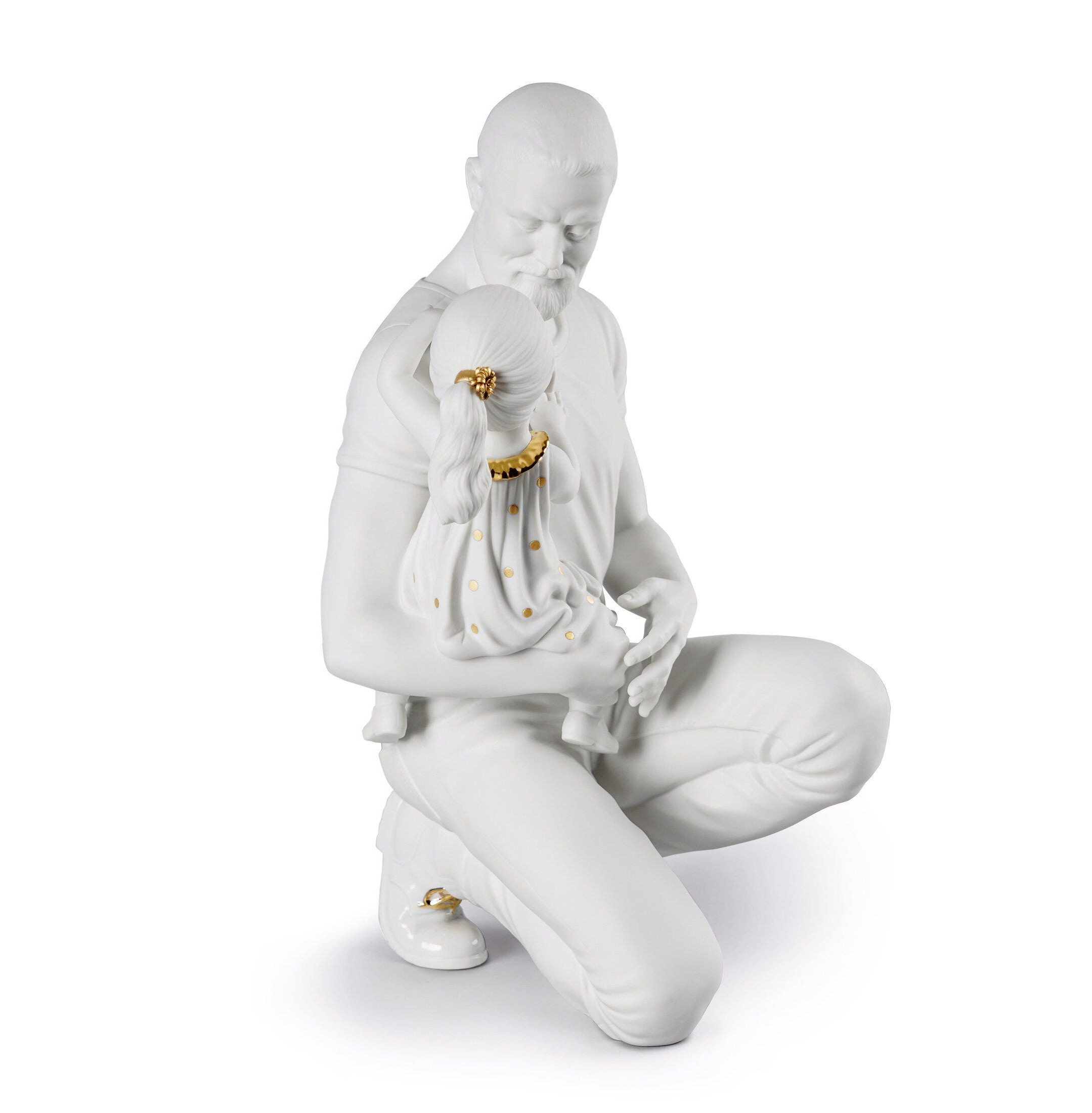 Figurka w ramionach tatusia. Złoty i biały połysk Figurka w ramionach tatusia. Złoty i biały połysk