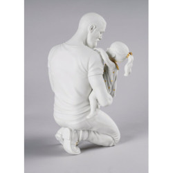 Figurka w ramionach tatusia. Złoty i biały połysk Figurka w ramionach tatusia. Złoty i biały połysk